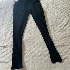 Black leggings with design on bottom of pant legs